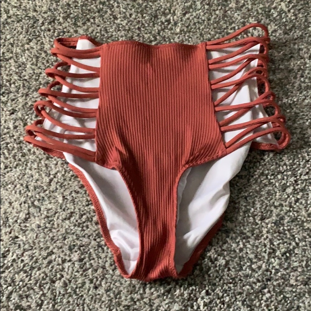 Victoria’s Secret pink high waist bikini bottoms.